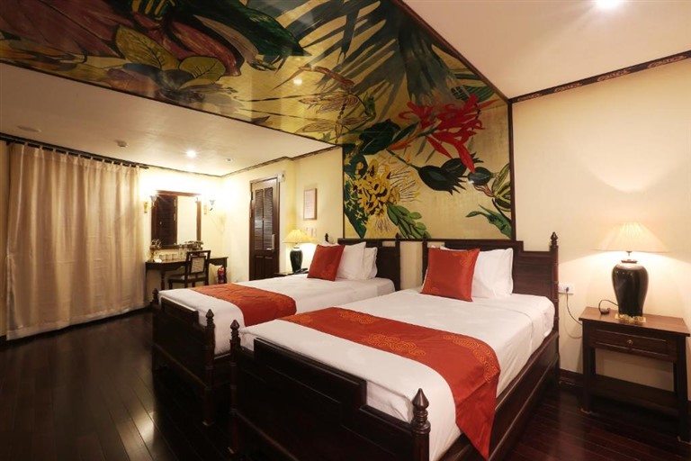 Phòng có giường đôi và giường đơn cho khách hàng thoải mái lựa chọn.